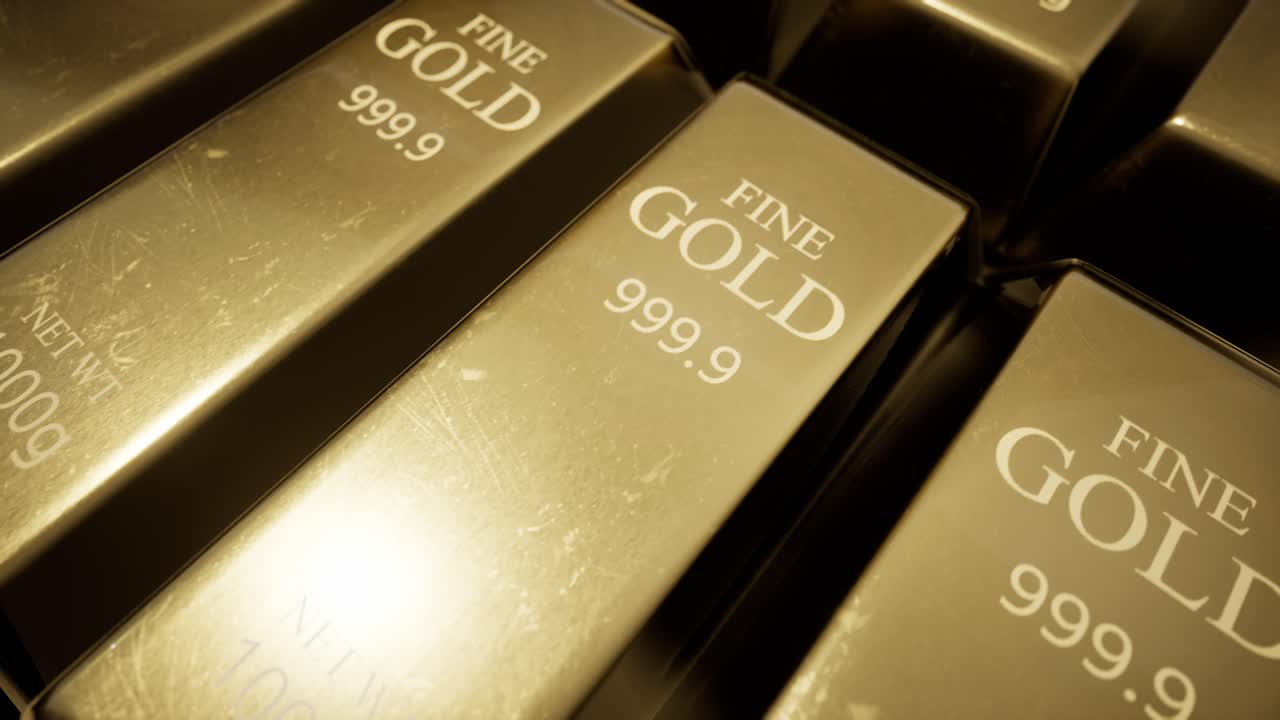 Primo piano di una pila di lingotti d'oro puro