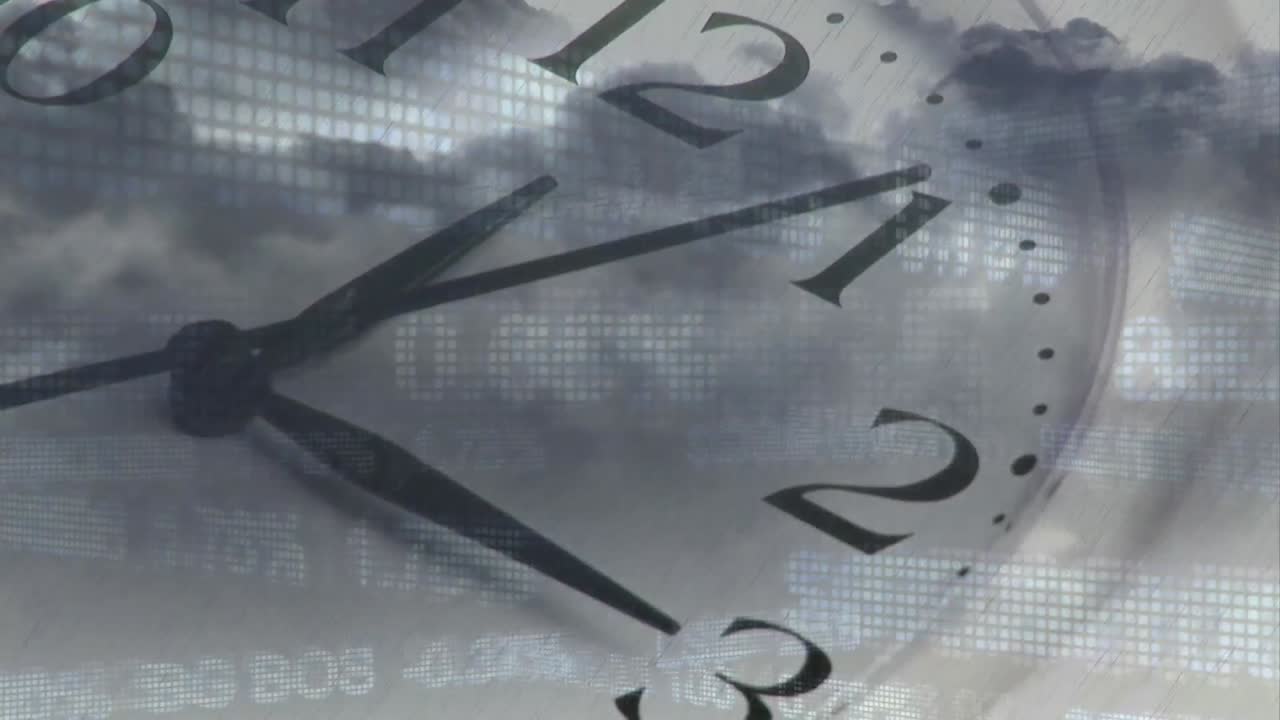 Digital composition of financial data processing and clock ticking against night sky