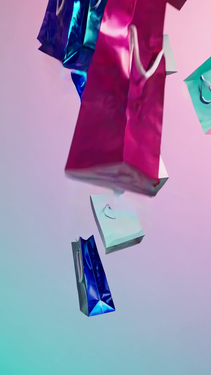 Colorful shopping bags captured mid-air from a low-angle, creating a dynamic and playful video