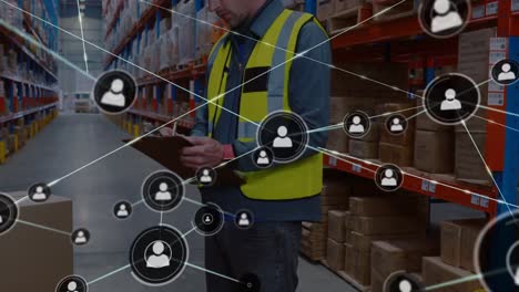 Animation-of-network-of-connections-with-icons-over-caucasian-male-warehouse-worker