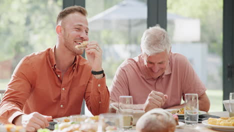 father and son enjoying a meal together