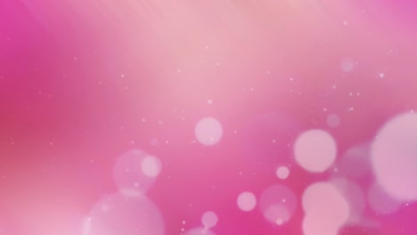 abstract blurry glowing pink background with bokeh.