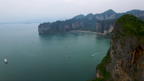 Remarkable-aerial-shot-over-an-exotic-tropical-island-and-limestone-cliffs