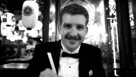 man in tuxedo at a japanese restaurant