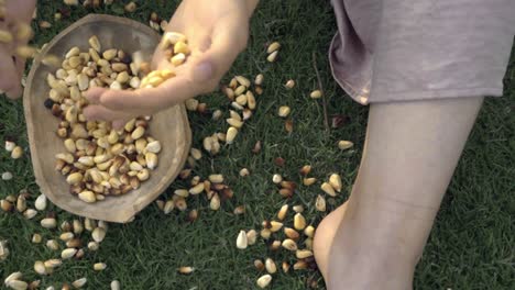 girls holding corn before cook it barefoot