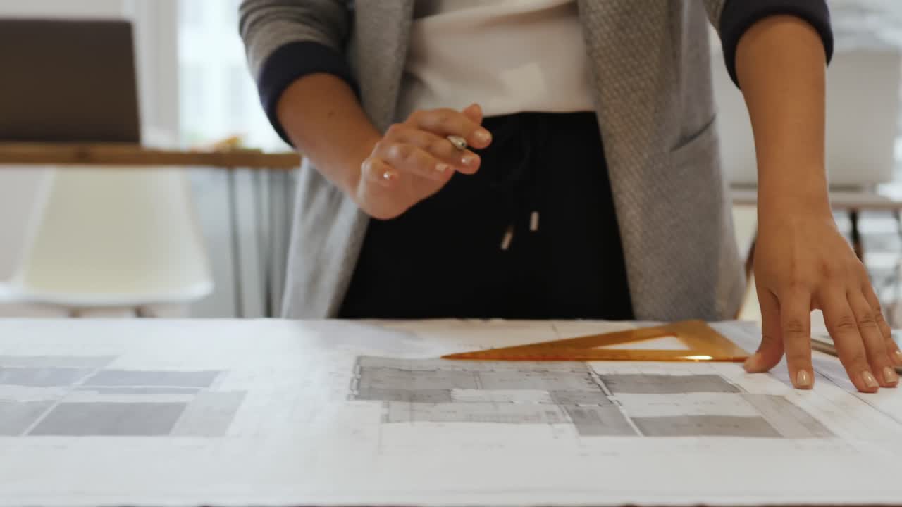 Millennial female professional working in a creative office