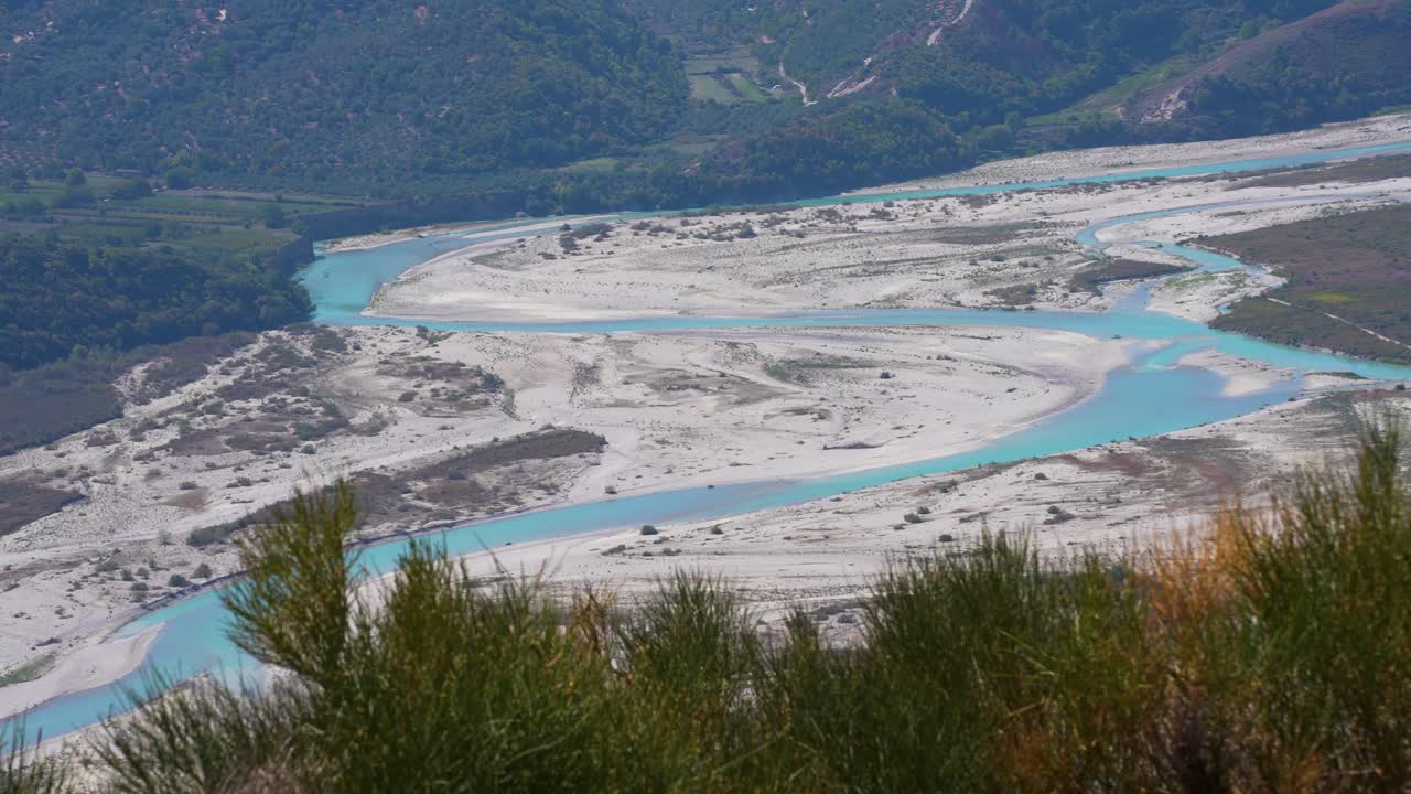 Vjosa River Valley Winding Through Olive Groves and Vineyards Amid Pristine Green Hills