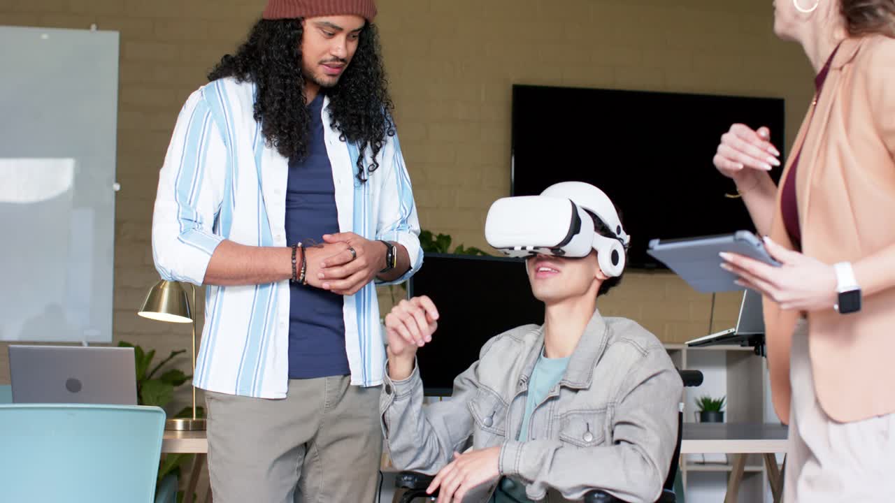 Diverse coworkers guiding man in wheelchair wearing VR headset, exploring office demo, copy space