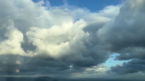 Cockpit-view-flying-climbing-after-take-off-toward-some-cumulus-in-a-cold-winter-moorning