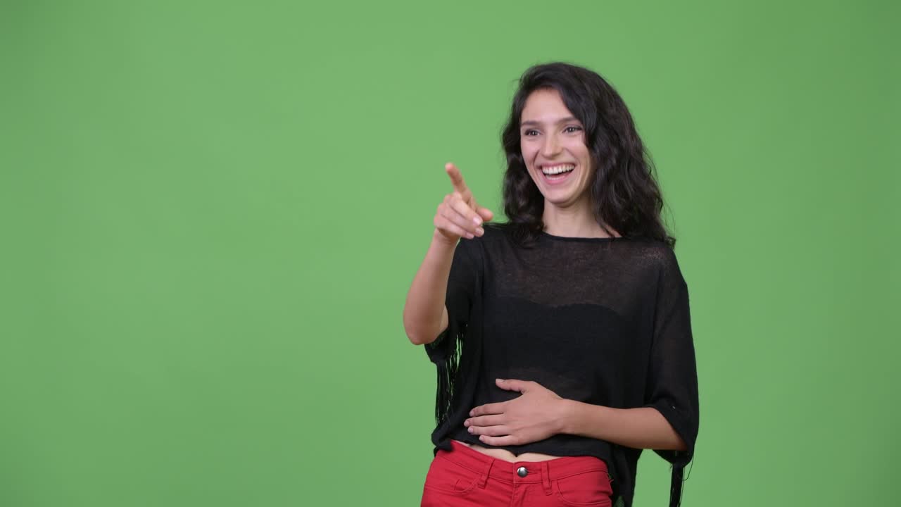 Young beautiful woman laughing