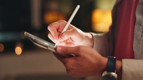 using a stylus on a tablet for digital art and design