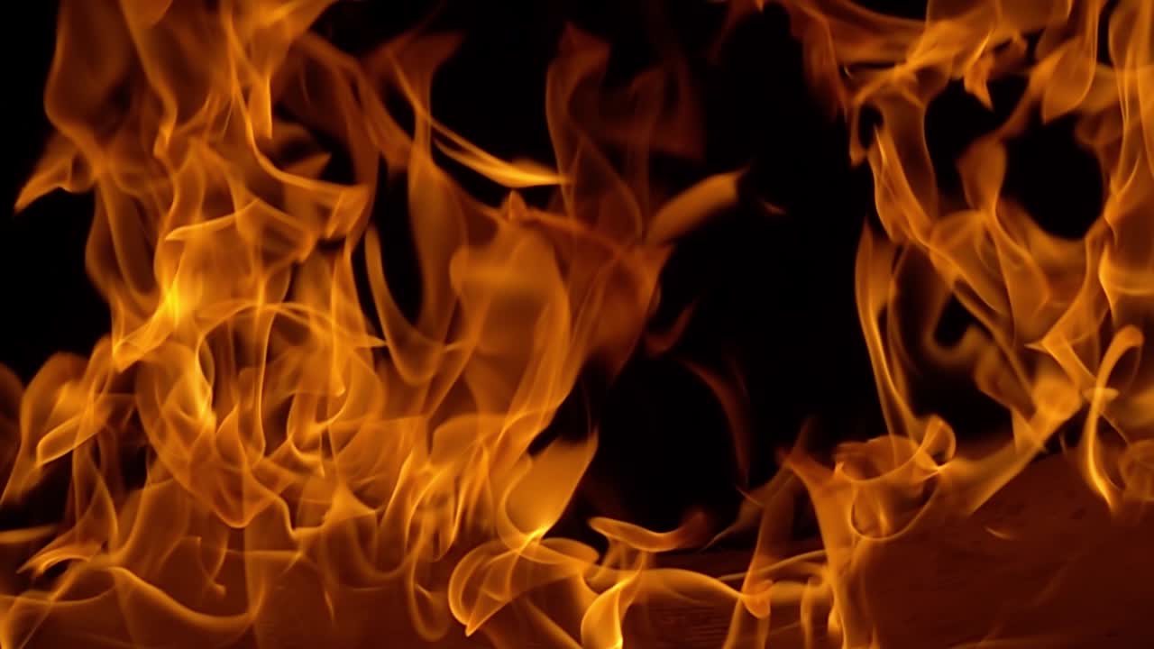 Flames of fire on black background in slow motion
