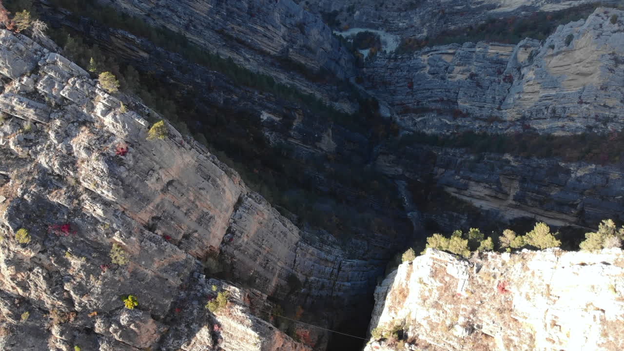 Aerial View of a Deep Canyon with Rock Formations