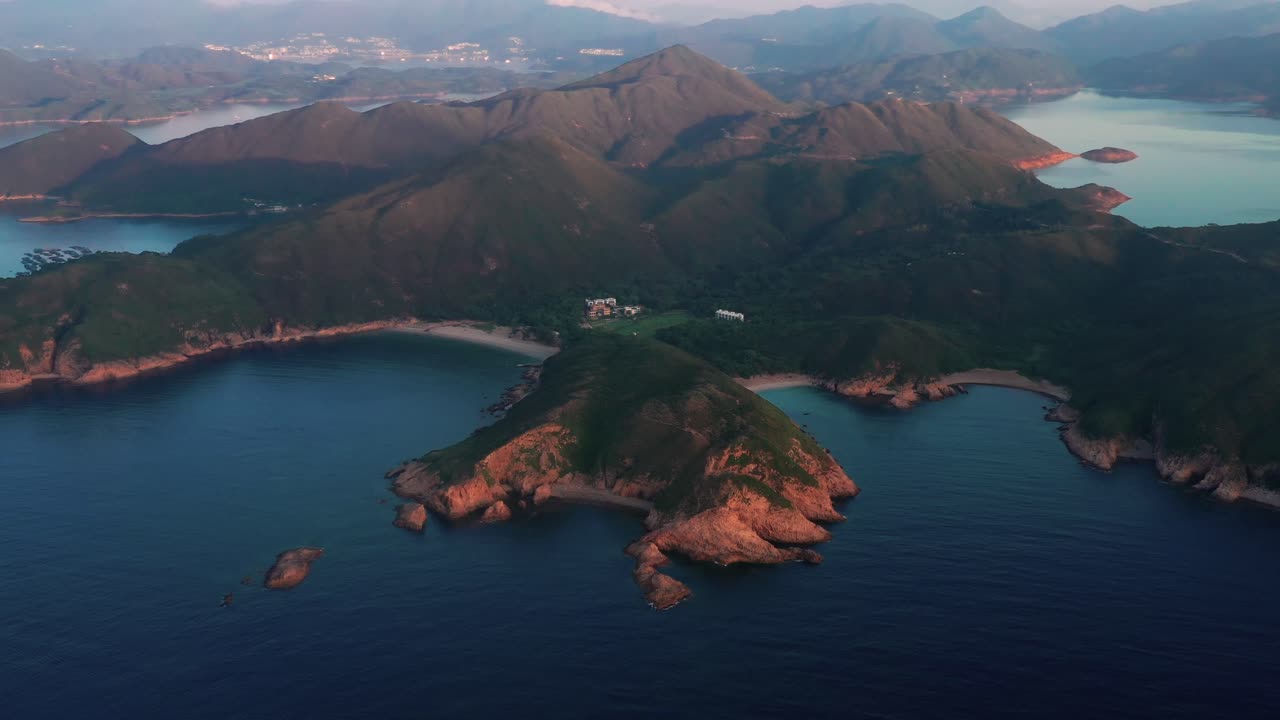 Aerial view of a beautiful island in Sai Kung, Hong Kong. Coast of lush tropical Sai Kung island landscape. Rugged coastline of island in Sai Kung.