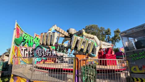 amusement park ride swings and rotates