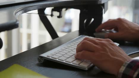 young man working in a creative office