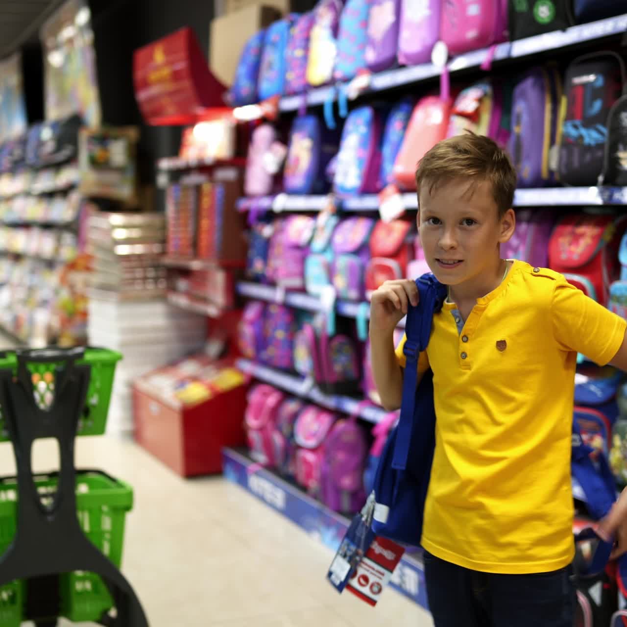 Boy choosing school supplies