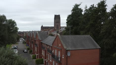 drone shot rising over liverpool housing estate