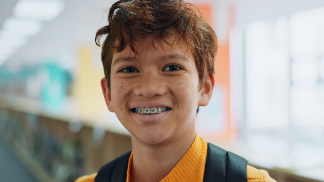 Portrait of a Smiling Boy with Braces