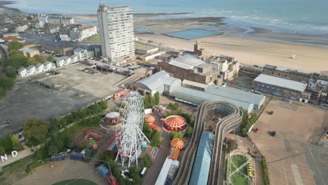 Drone-footage-of-Dreamland,-Kent-with-the-sea-in-the-background