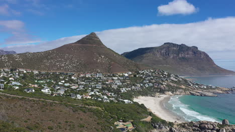 Aerial-back-traveling-over-South-Africa-coastline-sunny-afternoon