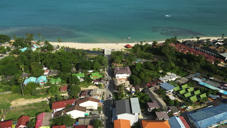 buildings on the sunny coastline of maret in koh samui