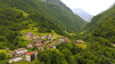aerial view of a mountain village in a green valley