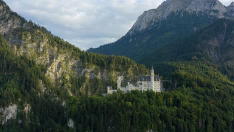 neuschwanstein castle, bavarian alps germany, aerial zoom out panorama