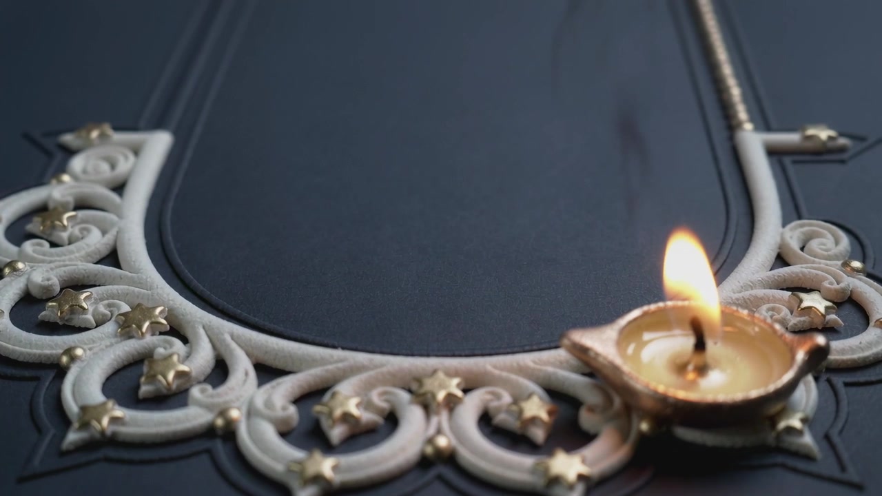 Moving camera revealing ornate border, brass oil lamp flickering in breeze on dark panel