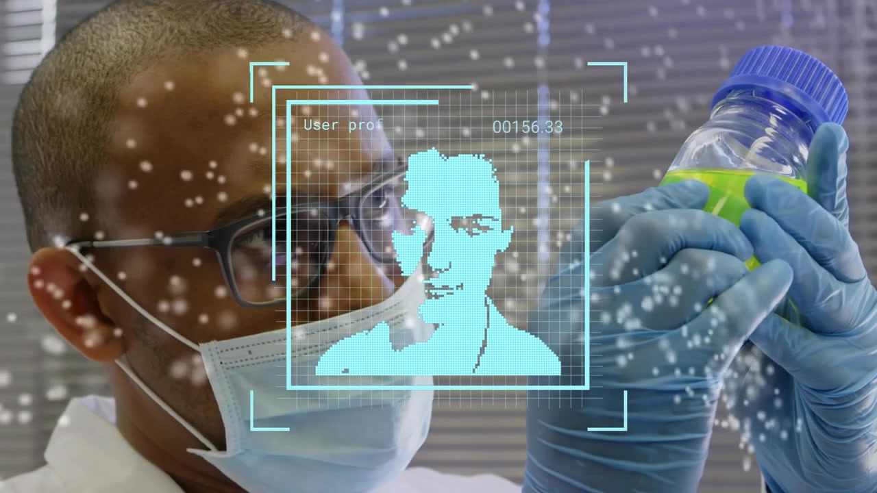 Animation of profile icons and dna structure over male scientist working at laboratory