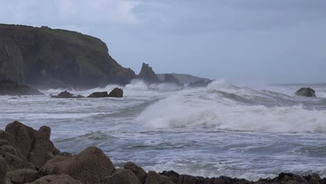 winter-storm-rough-seas-high-waves-rugged-coastline-Copper-Coast-Waterford-Ireland-in-a-winter-storm