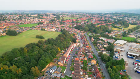 Dive-into-Dewsbury-Moore-Council-estate's-allure-through-breathtaking-drone-footage,-spotlighting-the-famous-urban-housing,-red-brick-terraced-homes,-and-the-industrial-Yorkshire-charm