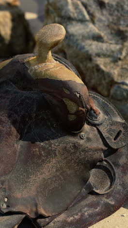 close up of an old leather saddle