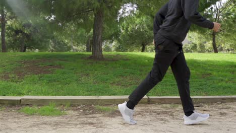 Headphone-runner-just-tied-shoelaces-and-starts-running