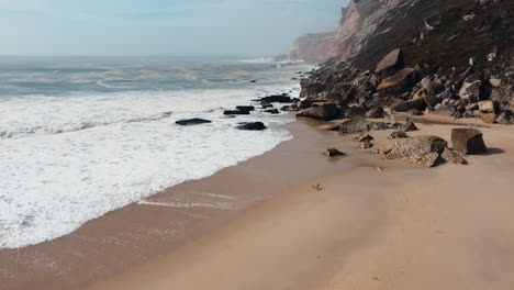 aerial of enchanting beach of nazaré, portugal