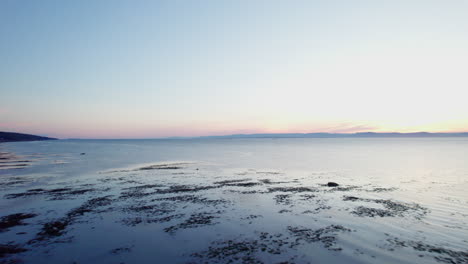 drone's view of the saint lawrence river in gaspésie during golden hours