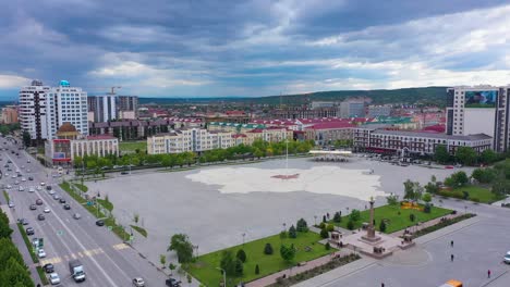 grozny, the chechen republic of ichkeria, caucasus, russia - 6 september 2019: day of civil concord and unity celebration in capital near the heart of chechnya. people on square near islamic mosque