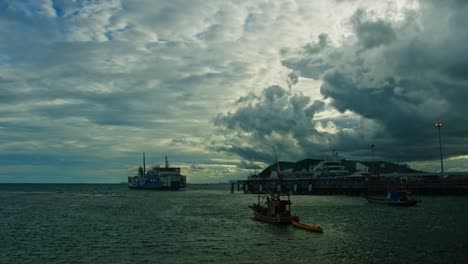 port with boats under stormy clouds