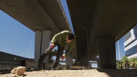 caucasian man practicing parkour