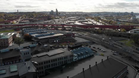 aerial pullback revealing gamlestaden cityscape views, gothenburg - sweden