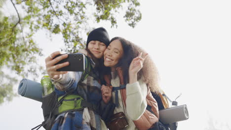 friends, peace sign and selfie outdoor in nature