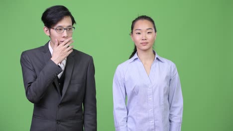 young asian business couple together