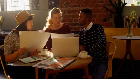 executives discussing over document 4k