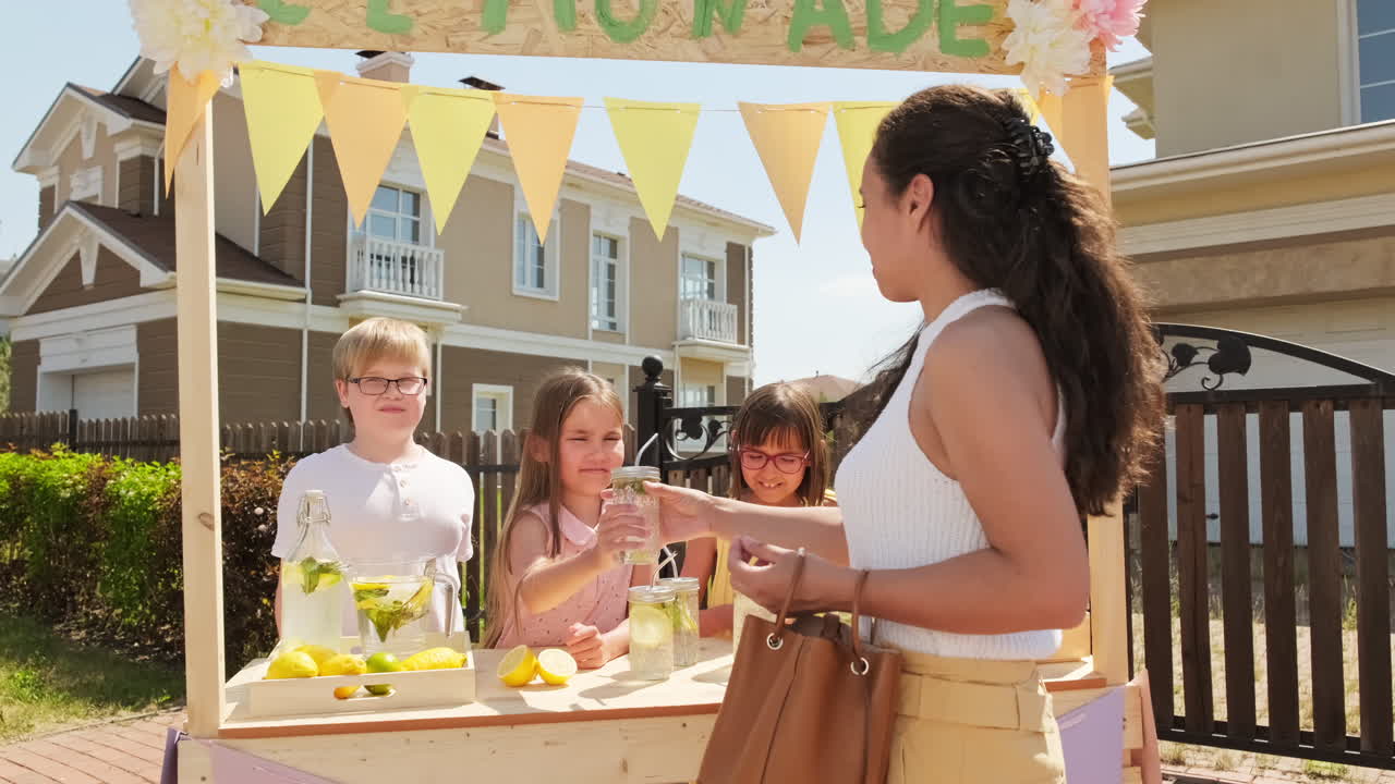 Woman Buying Fresh Lemonade Outdoors