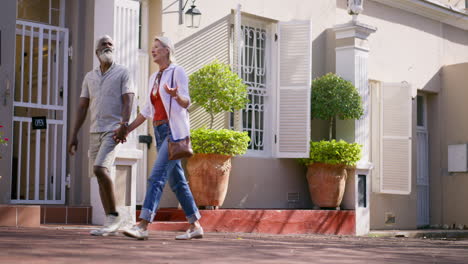 couple walking on a sunny street