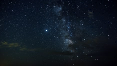 Stunning-time-lapse-of-the-beautiful-clear-night-sky-with-the-milky-way,-bright-stars,-and-multiple-meteors-during-the-Perseid-meteor-shower-in-the-desert-of-Five-Mile-Pass-in-Utah