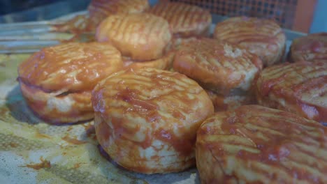 grilled burgers on display