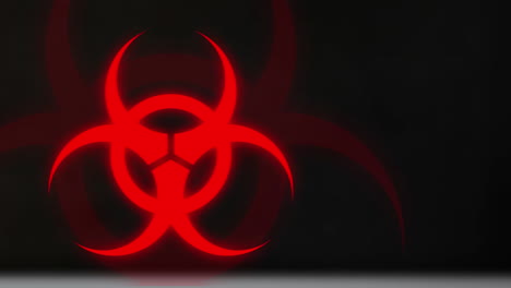 animación del símbolo de peligro biológico rojo sobre fondo negro