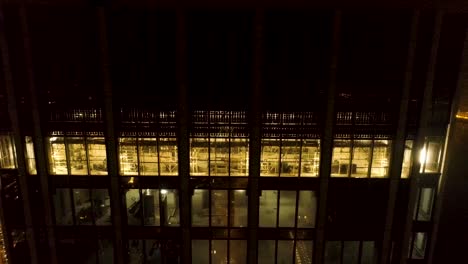 night view of a skyscraper under construction