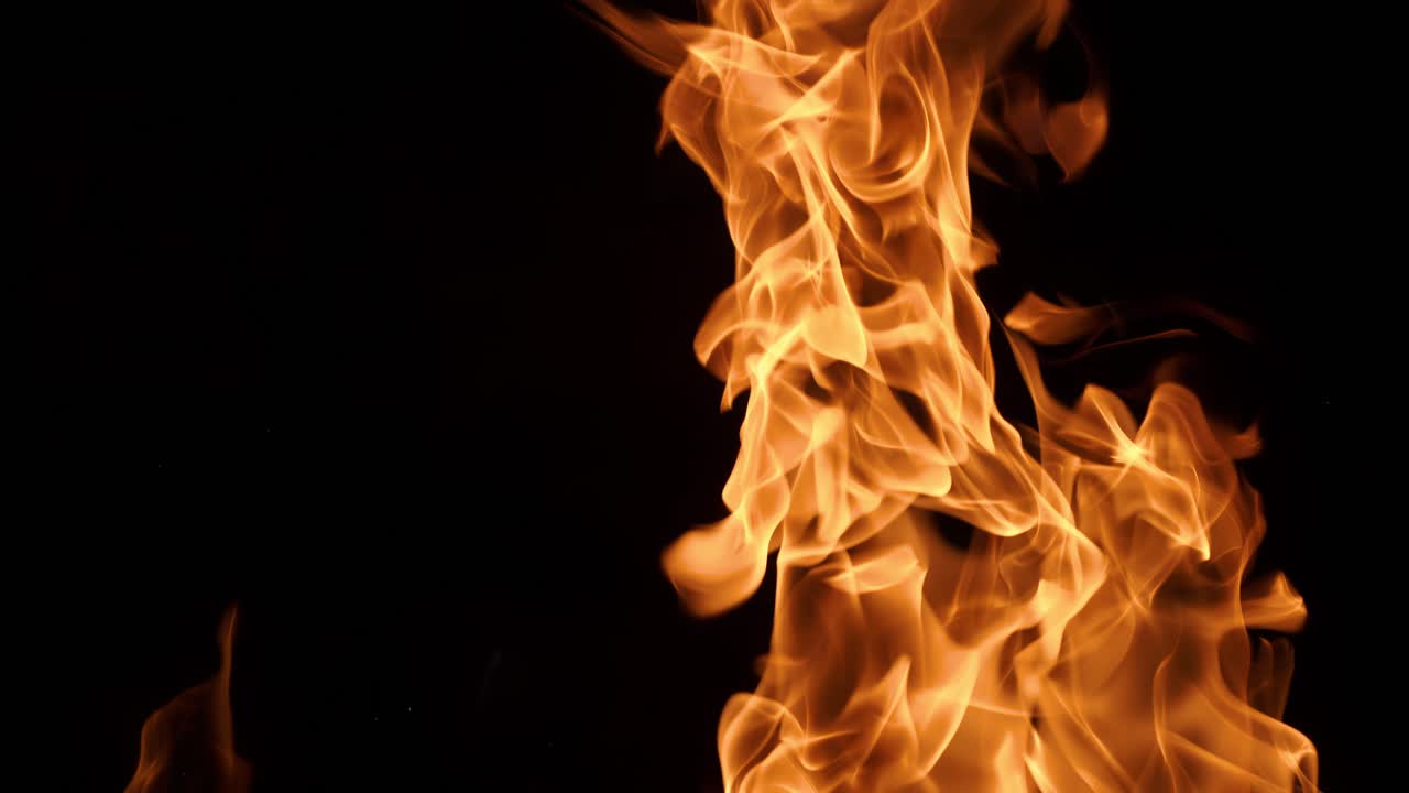 Flames of fire on black background in slow motion. Shot on super slow motion camera 1000 fps.